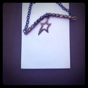 Mixed metals star necklace